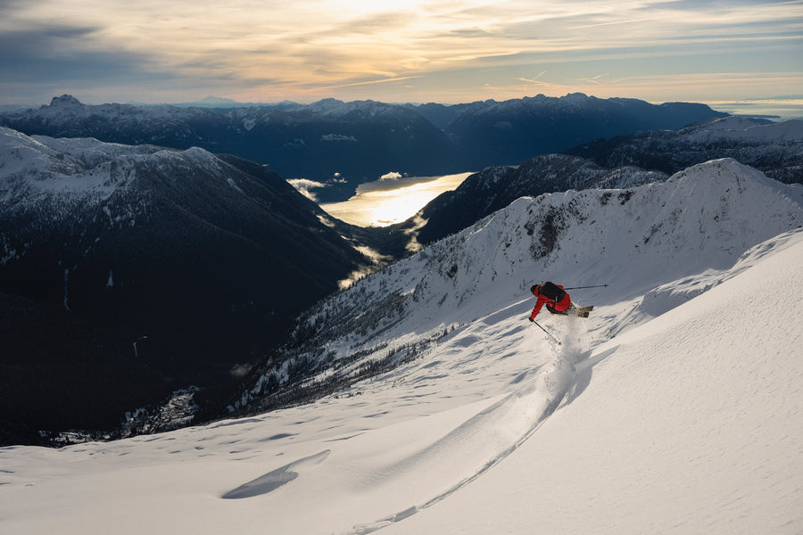 A Small Tractor and A Massive Wall of Snow