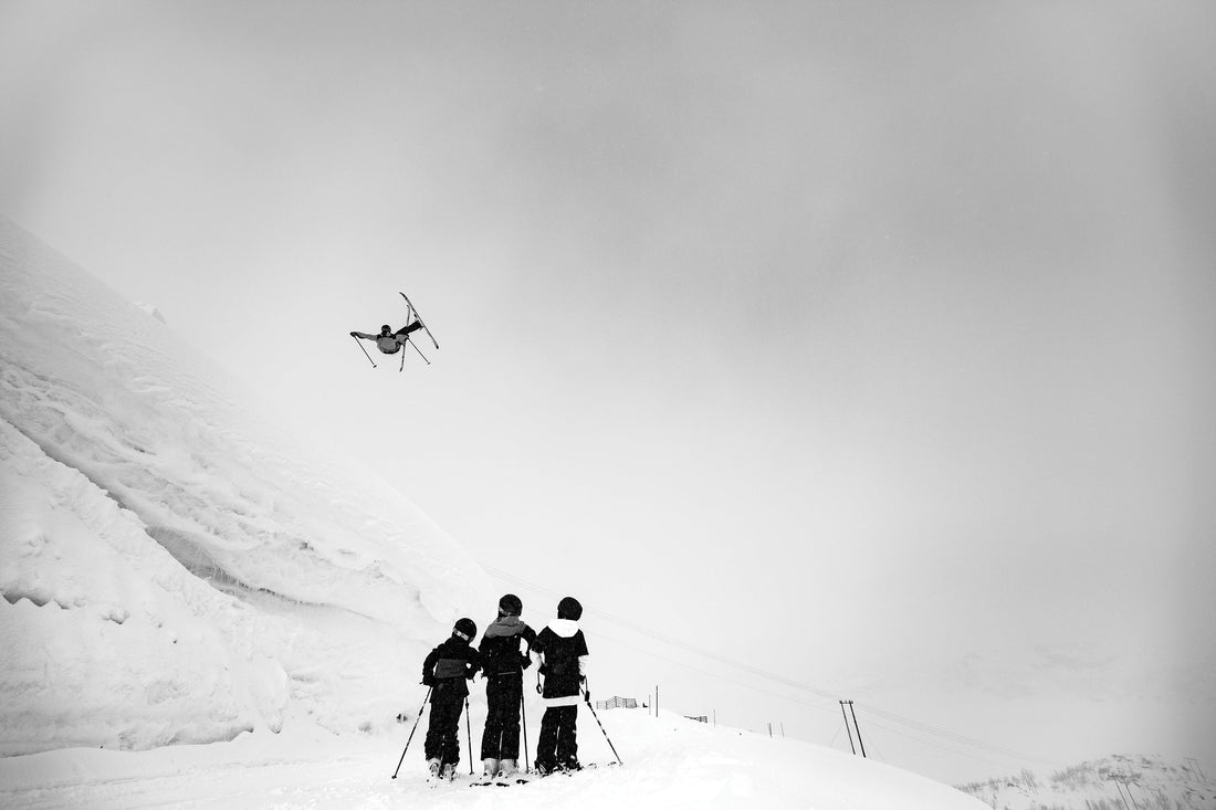 “On a gray day in Riksgränsen, Sweden, Max Palm hits a classic spot called Apelsinklyftan—which roughly translates to “orange wedge.” The onlookers approve.” Photo: Elias Lundh